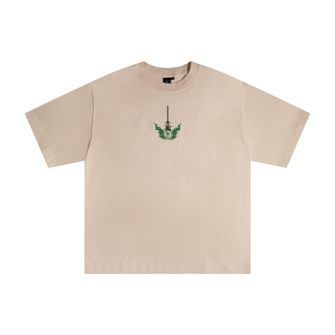 Beige t-shirt with a graphic design on a white background