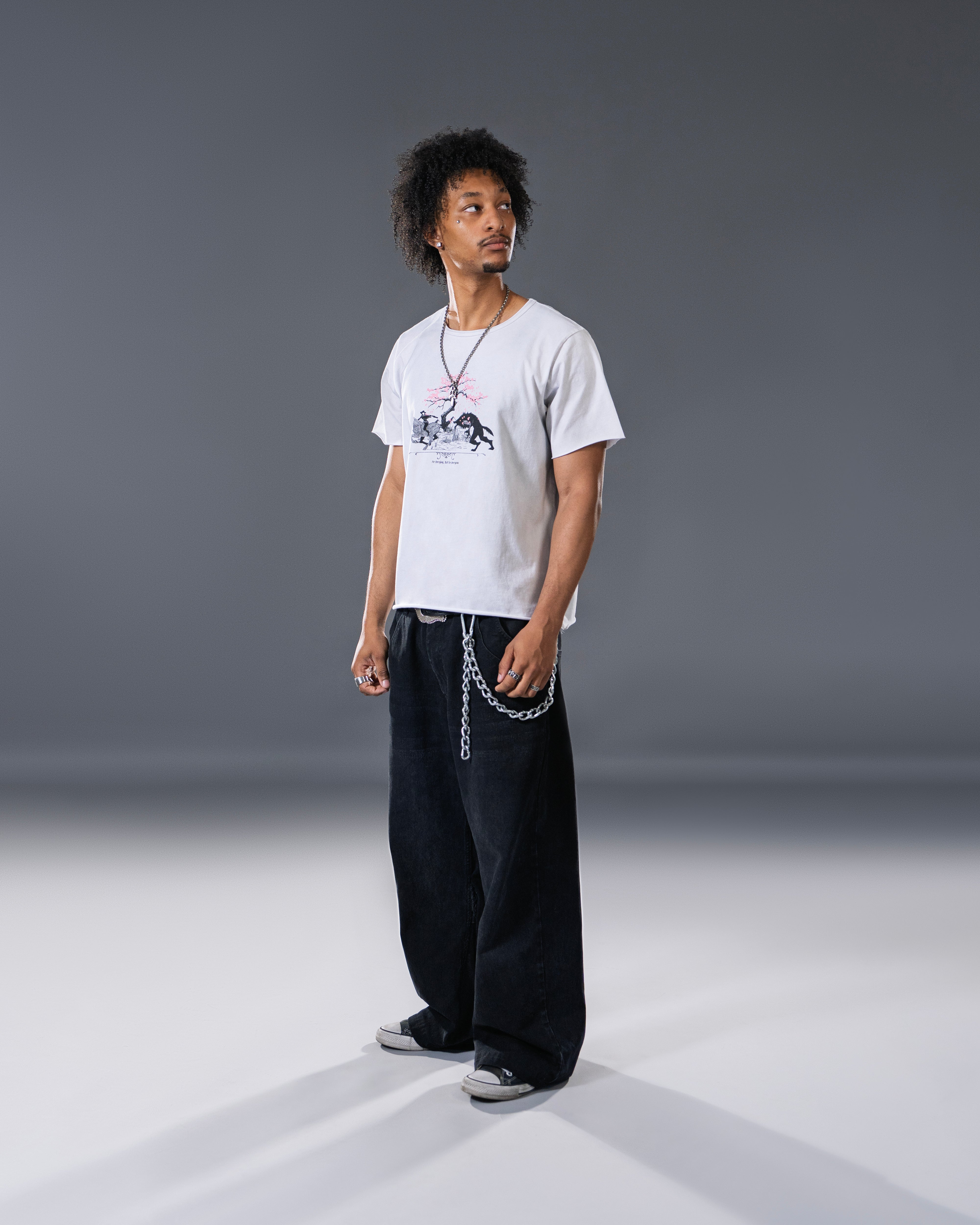 Vintage washed off-white mid length tee with original huntsmen fantasy inspired illustration with cherry blossom tree.