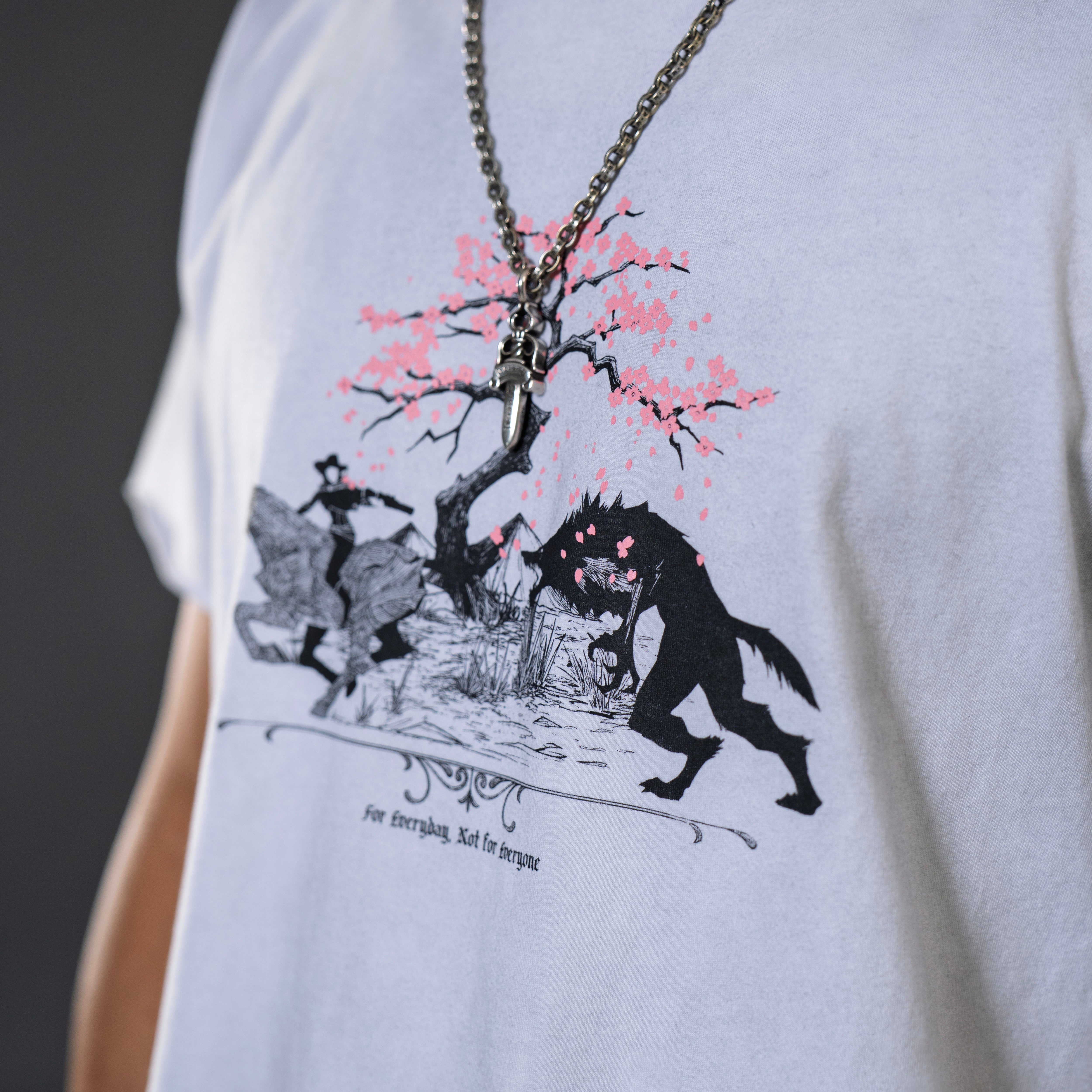Vintage washed off-white mid length tee with original huntsmen fantasy inspired illustration with cherry blossom tree.