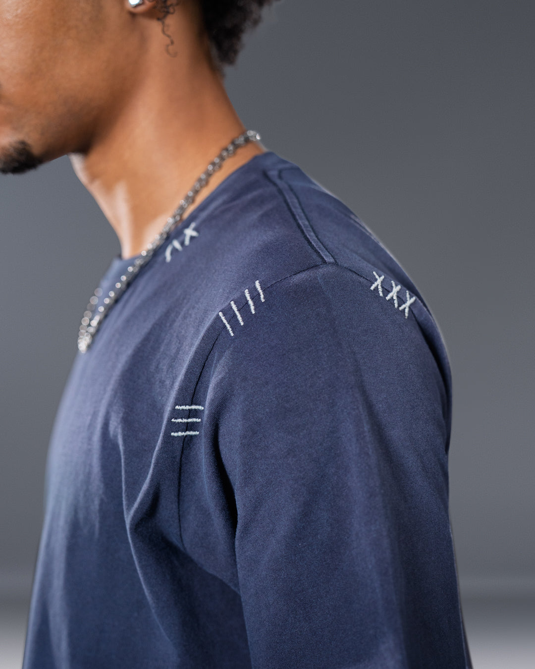 Navy relaxed harpy tee with embroidered stitch details