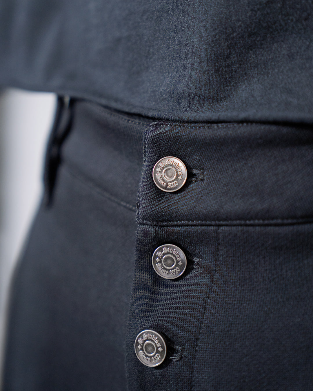black pleated bootcut straight leg trousers