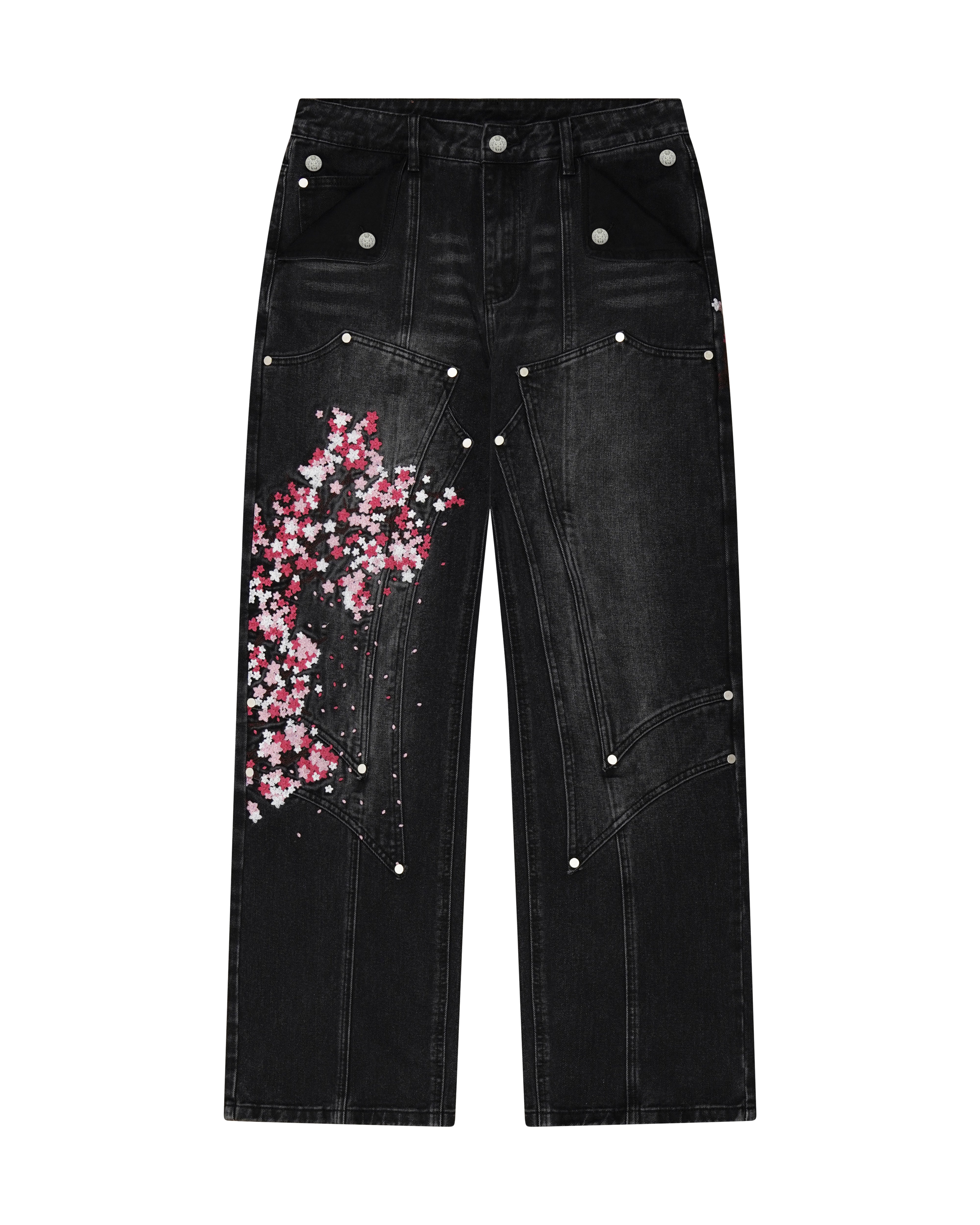 Black denim jeans with cherry blossom floral embroidery and armored inspired paneling.