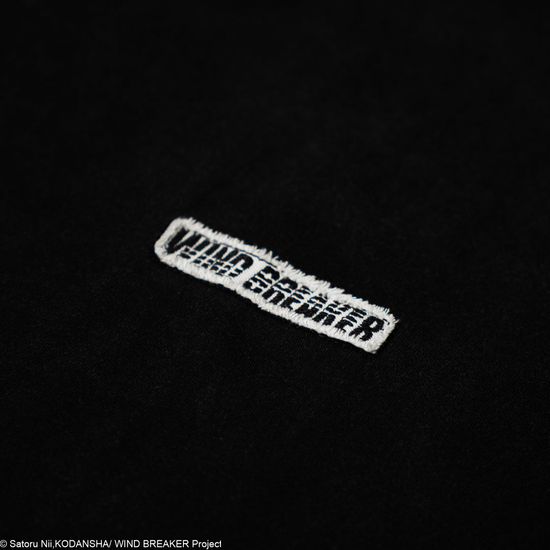 White logo on a black t-shirt.