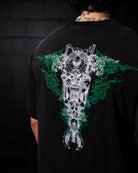 Black t-shirt with a detailed graphic design on the back against a dark background. 