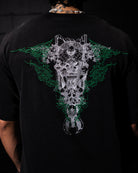 Black t-shirt with a detailed graphic design on the back, worn by a person.