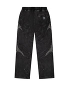 Back of black sweatpants with embroidery patterns on sides, right side pocket on a white background. 