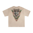 Beige t-shirt with a graphic design on the back featuring a person and nature elements.