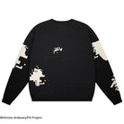 Black sweatshirt with white pixel art designs on a white background