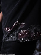 Black shirt with mushroom design. 