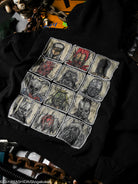 Black hoodie with a patches featuring various illustrations on a dark background