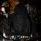 Black hoodie with a detailed spine design on the back, displayed against a dark, cluttered background.