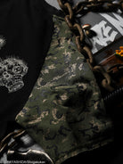 Close-up of a camouflage-patterned t-shirt detail.