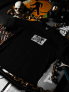 Black t-shirt with a graphic design on a dark background