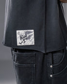 black vintage washed harpy tee with embroidered stitching 