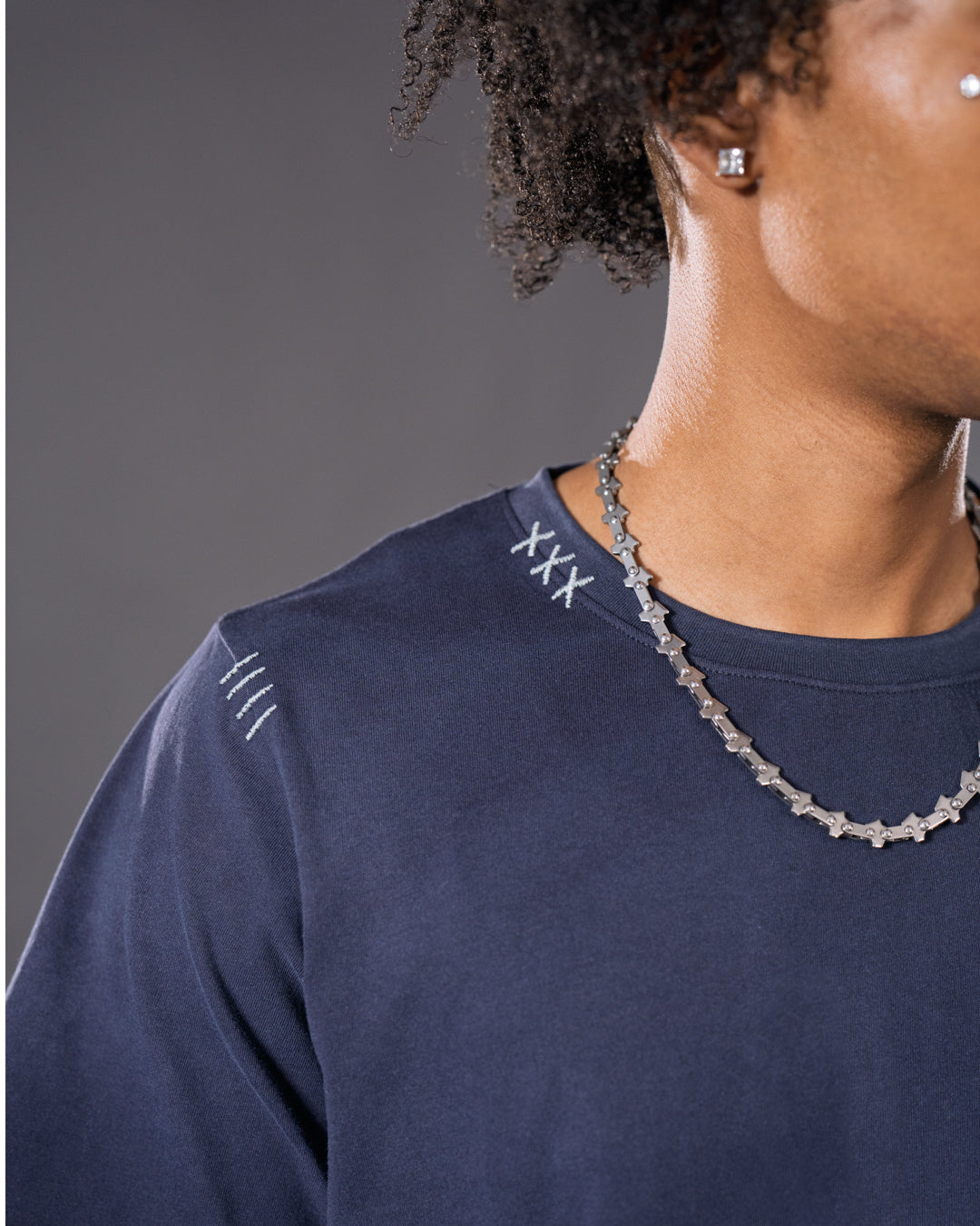 Navy relaxed harpy tee with embroidered stitch details