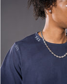 Navy relaxed harpy tee with embroidered stitch details
