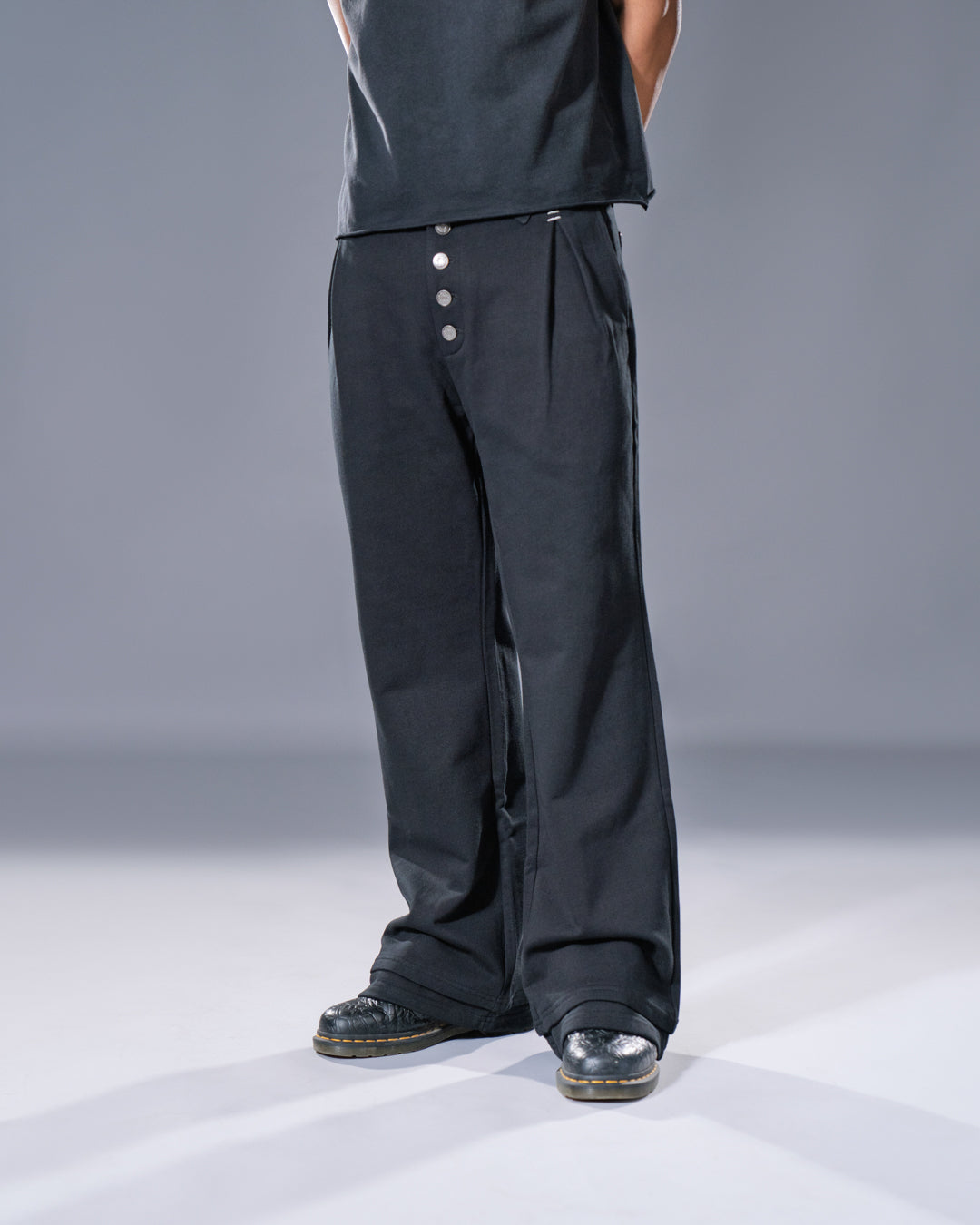 black pleated bootcut straight leg trousers