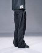 black pleated bootcut straight leg trousers