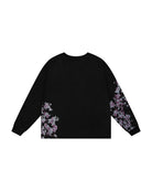 Black Henley long sleeve cotton tee with printed cherry blossom flower. 