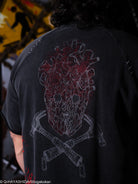 Black t-shirt with a red and white graphic design on the back, featuring a character and crossed tools.