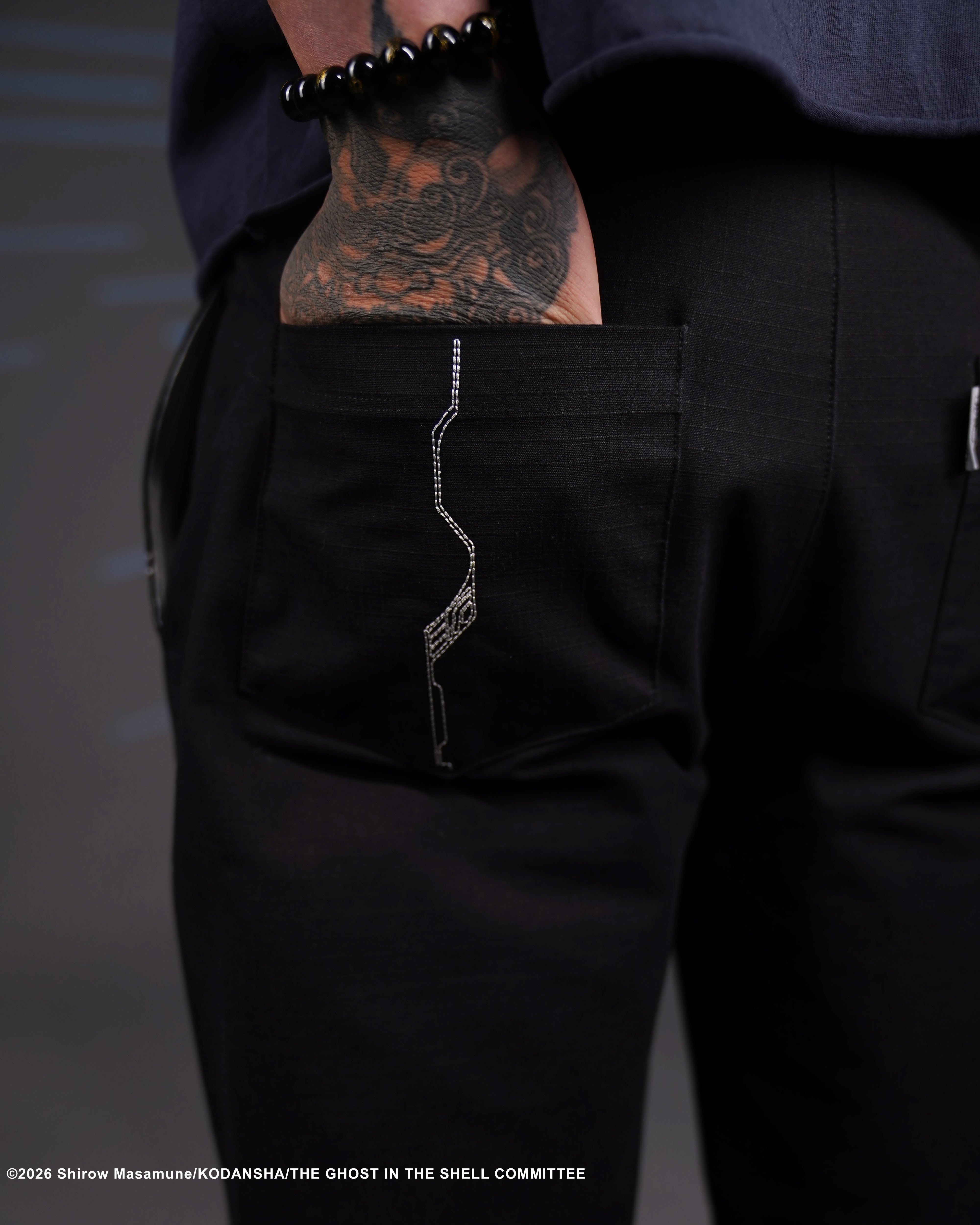 The Ghost in the Shell Ghost splice trousers in black 