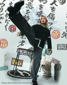 Person in black outfit with high kick against a white background with logos and text