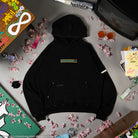 Black hoodie with a gold and green patch on the front. 